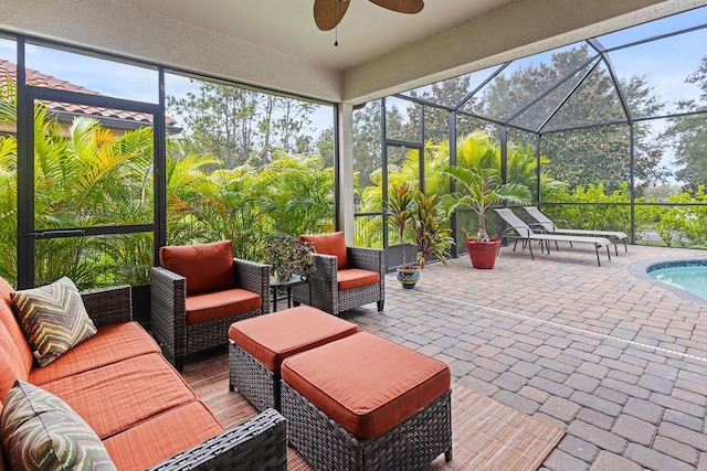 sunroom / solarium with ceiling fan