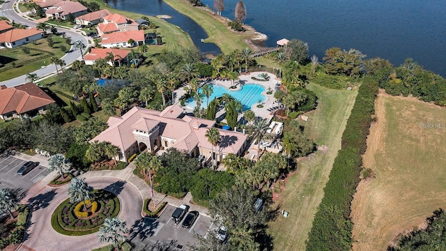 birds eye view of property featuring a water view