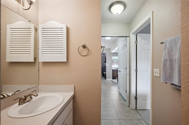 bathroom featuring vanity and tile patterned floors