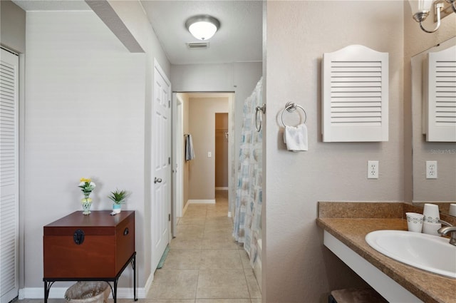 bathroom featuring vanity and tile patterned floors