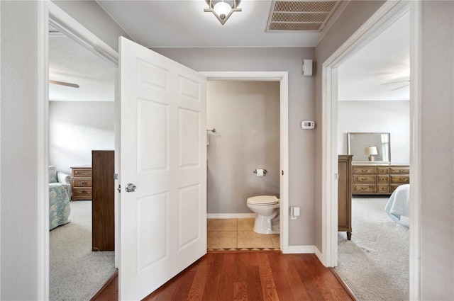 hall featuring wood-type flooring