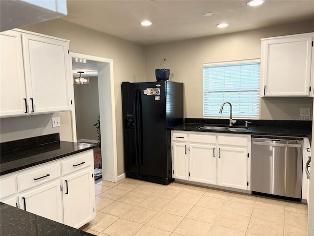 kitchen with a sink, white cabinetry, stainless steel dishwasher, black refrigerator with ice dispenser, and dark stone countertops