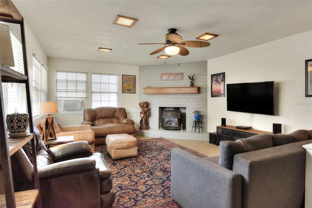 living room featuring cooling unit and a ceiling fan