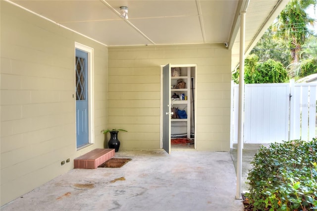 view of patio featuring fence