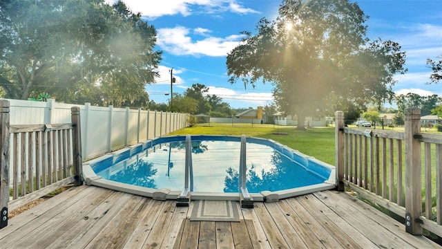 4390 Sunnyside Dr, Lakeland, FL 33810 - outdoor pool with a yard, a deck, and a fenced backyard