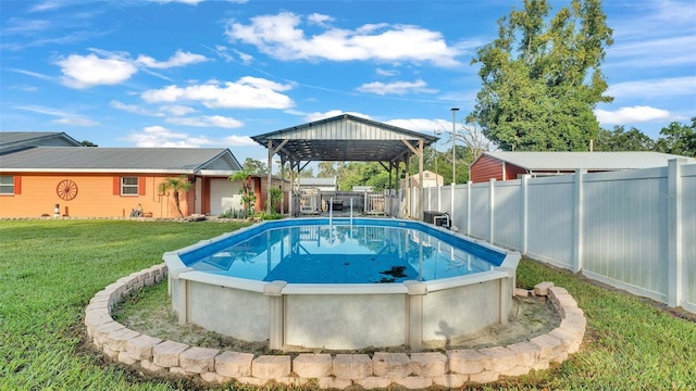 4390 Sunnyside Dr, Lakeland, FL 33810 - view of swimming pool with a fenced in pool, a gazebo, a fenced backyard, and a lawn