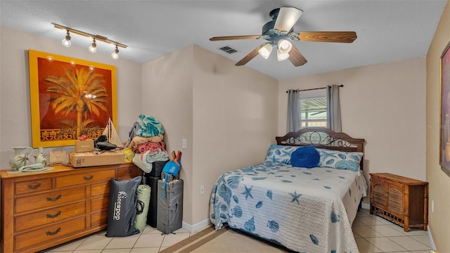 4390 Sunnyside Dr, Lakeland, FL 33810 - bedroom featuring light tile patterned floors, visible vents, track lighting, and ceiling fan
