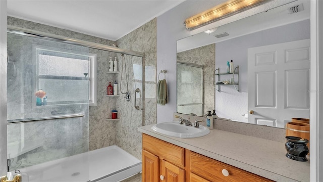 4390 Sunnyside Dr, Lakeland, FL 33810 - bathroom with a shower stall, vanity, and visible vents