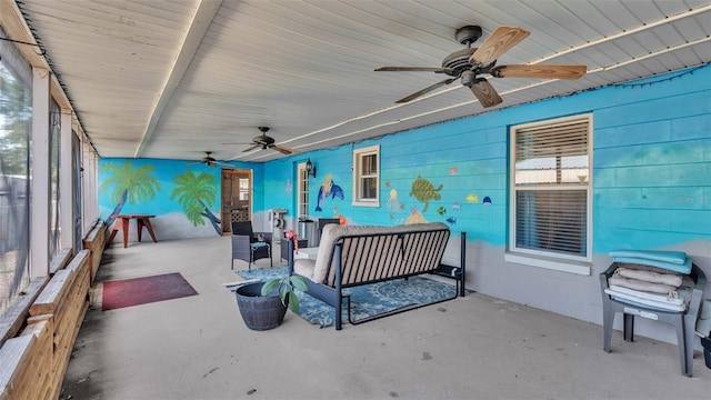 view of patio / terrace featuring ceiling fan and an outdoor hangout area