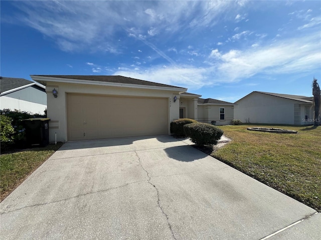 ranch-style home with a garage and a front yard