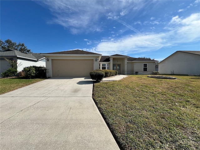 ranch-style home featuring a garage and a front lawn