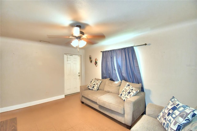 living room featuring ceiling fan