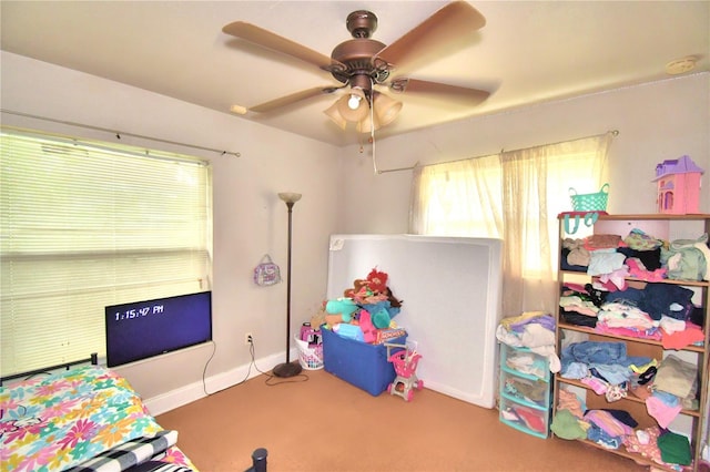 bedroom featuring carpet floors and ceiling fan