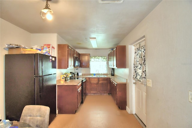 kitchen featuring black appliances and sink