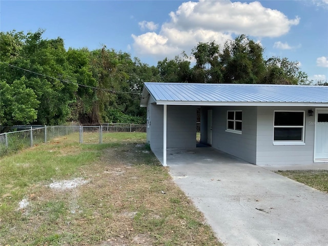 exterior space featuring a carport