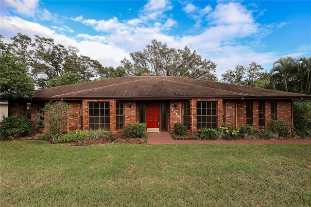 ranch-style house with a front yard