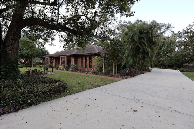 view of front of home with a front lawn