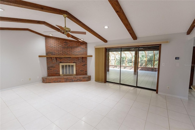 unfurnished living room with a brick fireplace, vaulted ceiling with beams, light tile patterned flooring, and ceiling fan