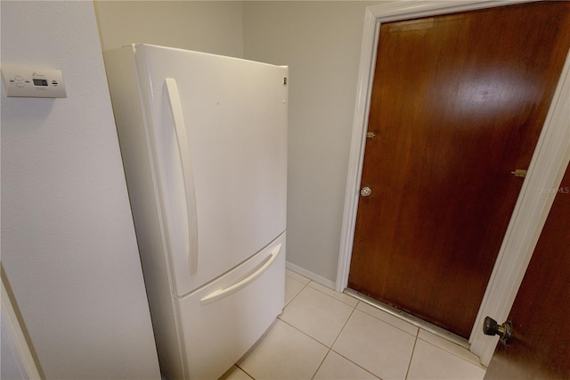 interior space featuring light tile patterned flooring