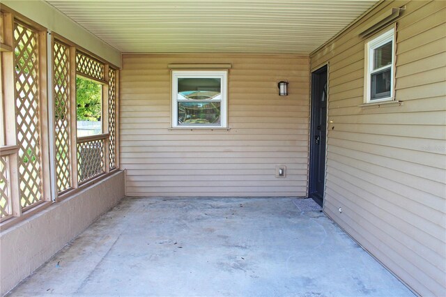 view of patio / terrace featuring an attached carport