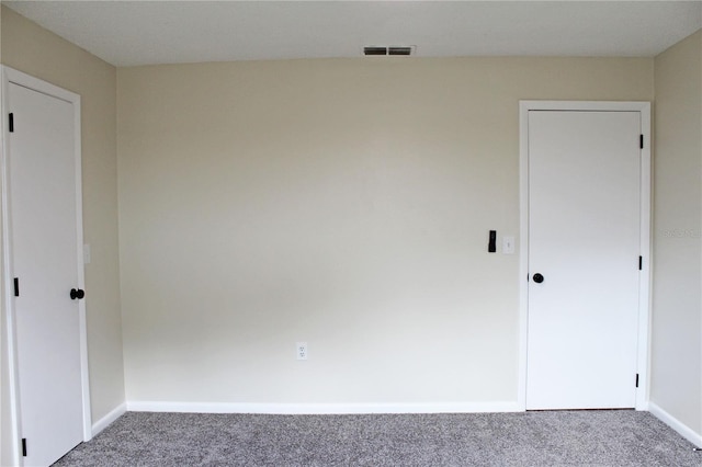 unfurnished bedroom with carpet