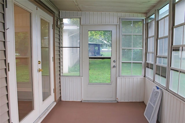 unfurnished sunroom featuring plenty of natural light