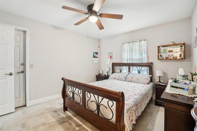 bedroom featuring ceiling fan