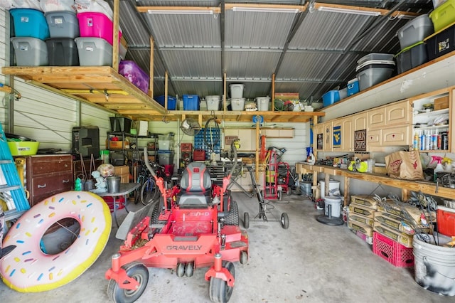 garage with a workshop area