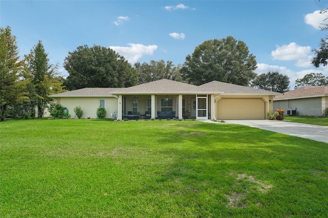 ranch-style house with a front yard and a garage