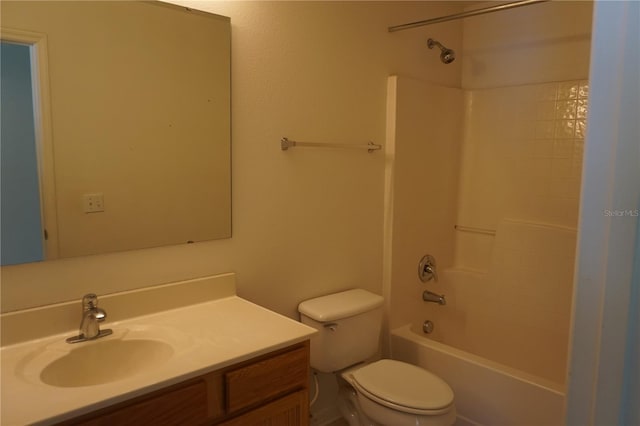 full bathroom with tub / shower combination, vanity, and toilet