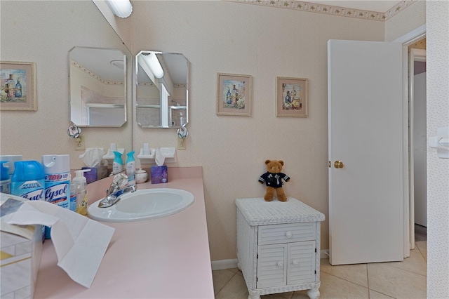 bathroom with tile patterned flooring and vanity