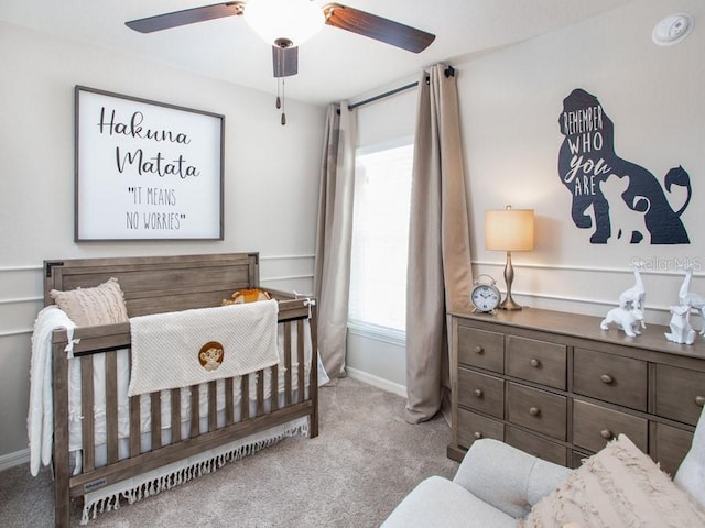 carpeted bedroom featuring ceiling fan