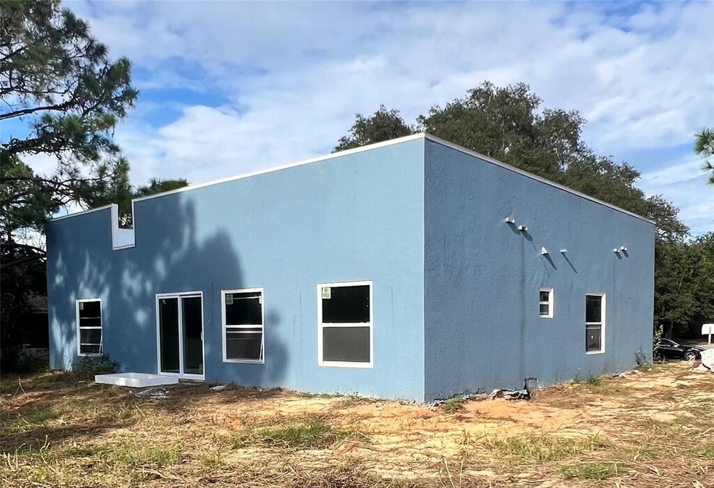 2626 Magnolia Cir, Lake Wales, FL 33898 - exterior space with stucco siding