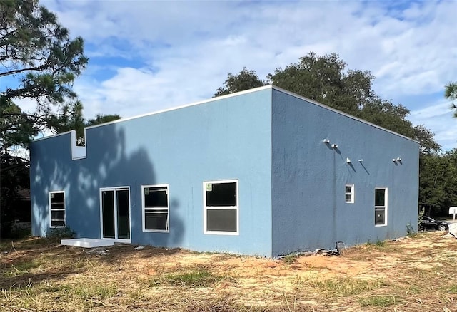 2626 Magnolia Cir, Lake Wales, FL 33898 - exterior space with stucco siding