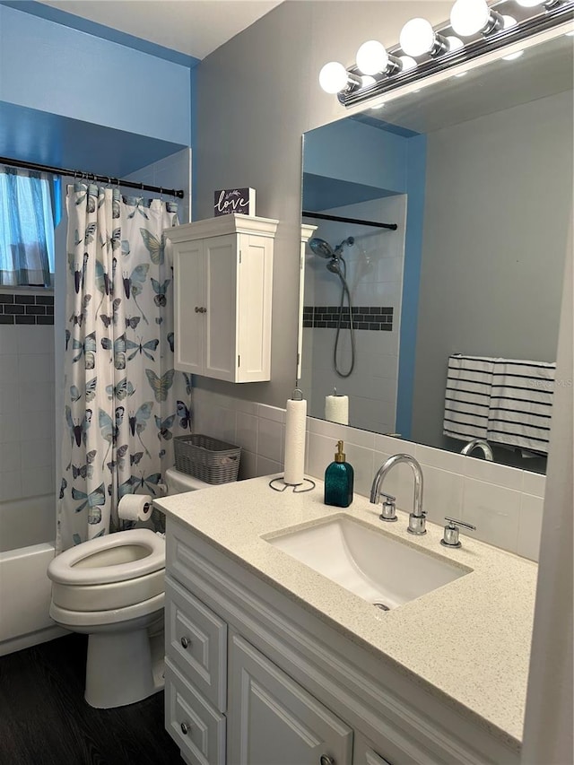 full bathroom with vanity, toilet, and shower / bathtub combination with curtain