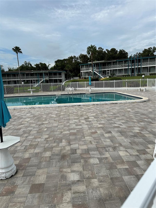 view of pool featuring a patio area