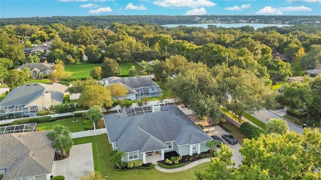 birds eye view of property featuring a water view