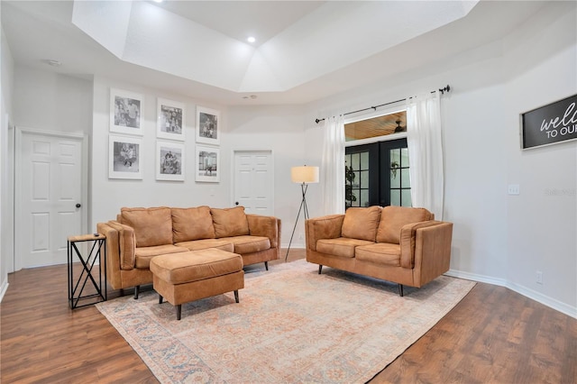 living room featuring french doors and wood-type flooring