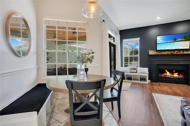 dining area with light hardwood / wood-style floors