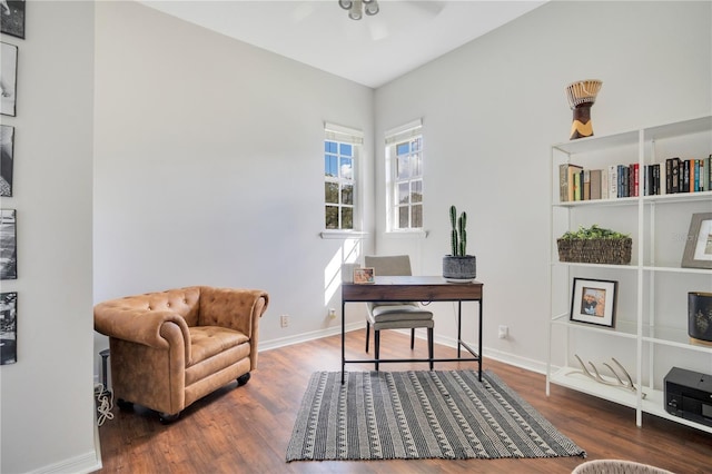 office space with dark hardwood / wood-style floors and ceiling fan