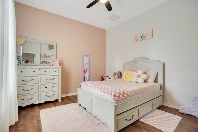 bedroom featuring dark wood-type flooring and ceiling fan