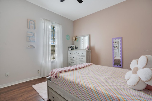 bedroom featuring dark wood-type flooring and ceiling fan