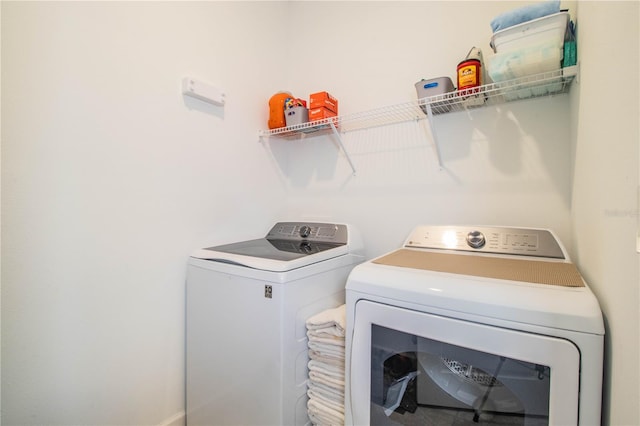 laundry area featuring independent washer and dryer