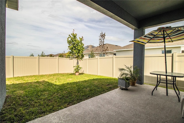 view of yard with a patio area