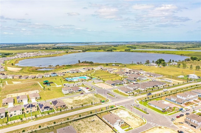aerial view featuring a water view and a residential view