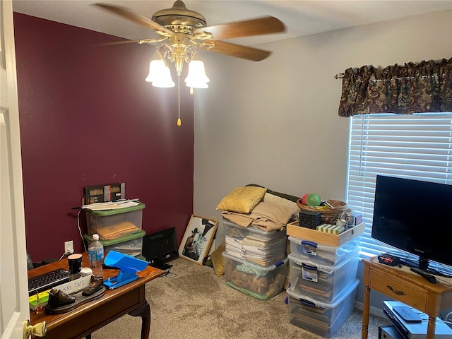 carpeted office with ceiling fan