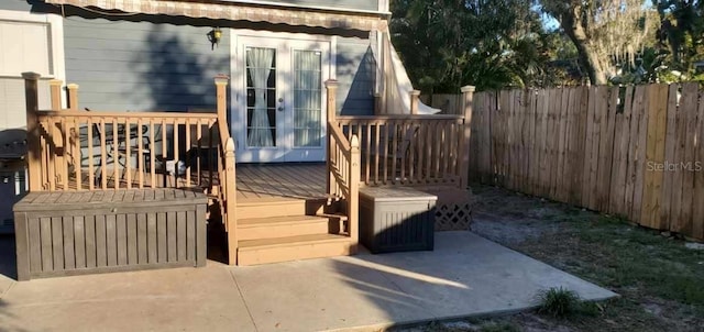 wooden deck featuring a patio area