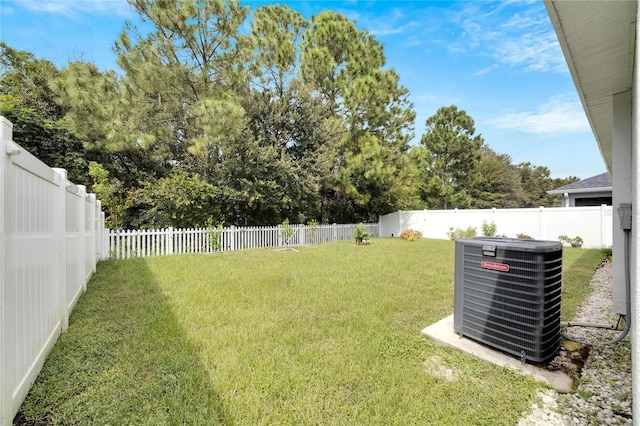 view of yard with central air condition unit