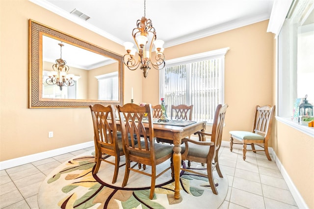 tiled dining space featuring a notable chandelier and crown molding