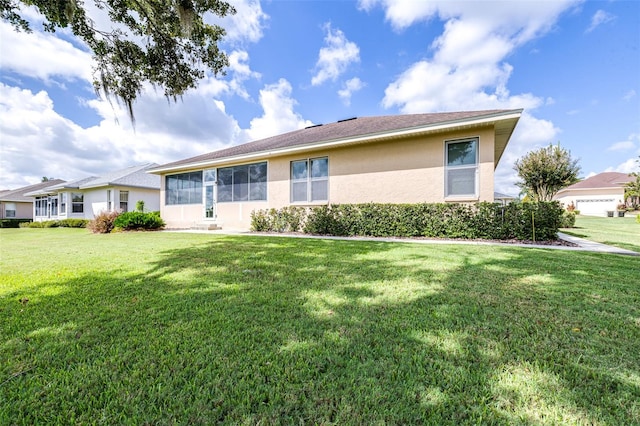 ranch-style house with a front lawn